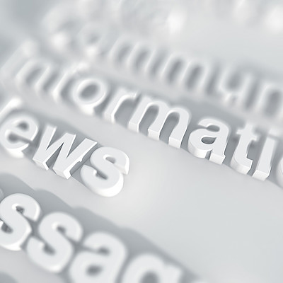 Several words (News) shown in relief on white background